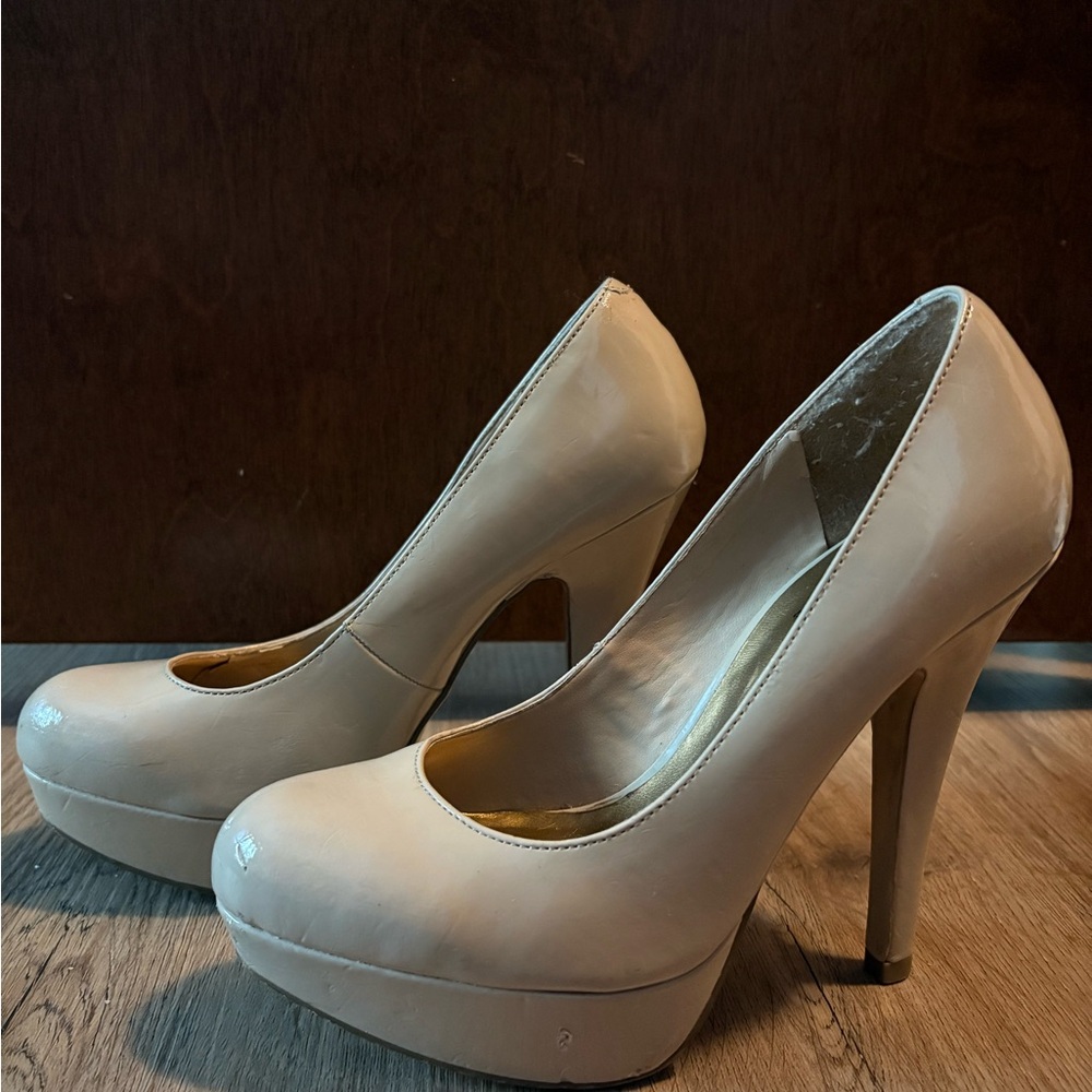 cream colored GUESS pumps